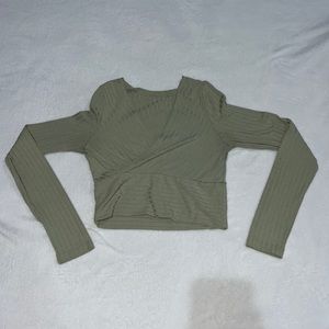 light green long sleeve shirt.